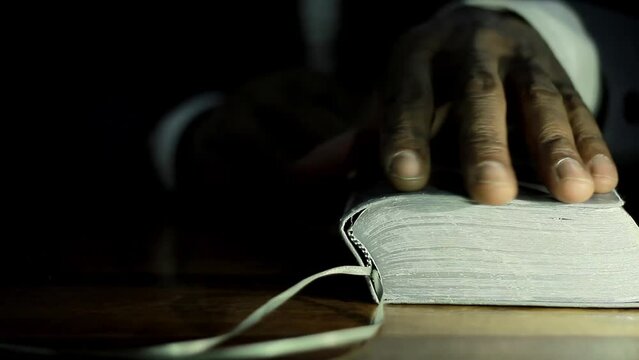 praying to god with bible on table with people stock video stock footage
