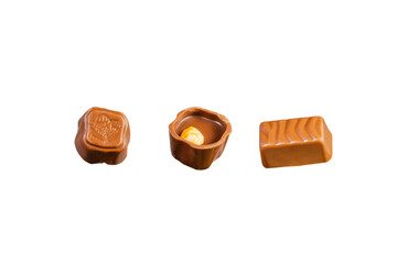 Delicious chocolate candy on white background