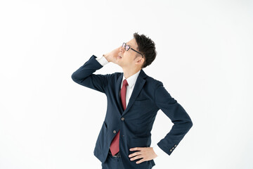 悩むビジネスマン