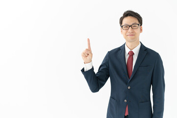 指を指すビジネスマン