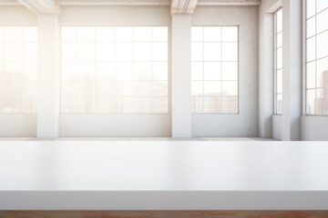 Fototapeta premium The empty white table on the background of a large office space with large windows overlooking the city. For product display montage.