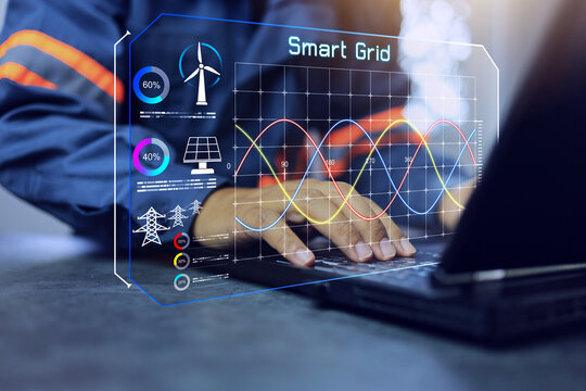 smart grid concept with engineer is checking the load balance of electricity usage in each area with a laptop computer to match the production capacity of the power plant