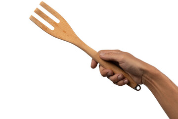 Hand holding wooden fork on white background cutout