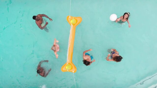 Diverse group enjoys a pool day, with copy space