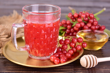 Medicinal tea or fruit drink made from viburnum berries with honey.	