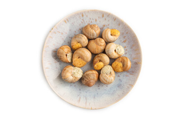 Grape (Burgundy) snails with butter and cheese isolated on white, top view