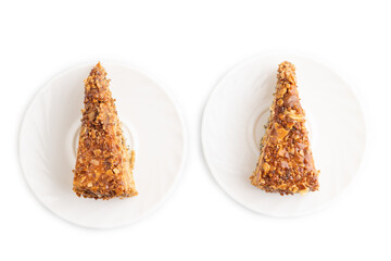 Walnut and hazelnut cake with caramel isolated on white. top view, copy space