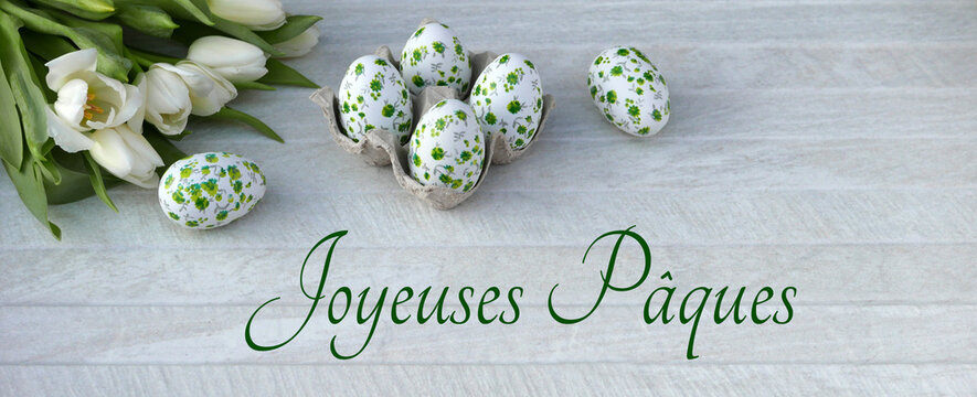 Carte de P&acirc;ques&nbsp;: &oelig;ufs de P&acirc;ques avec fleurs et texte Joyeuses P&acirc;ques	