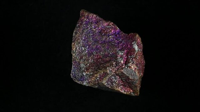Peacock Ore / Bornite / Chalcopyrite (copper ore) sample rotating against a black background