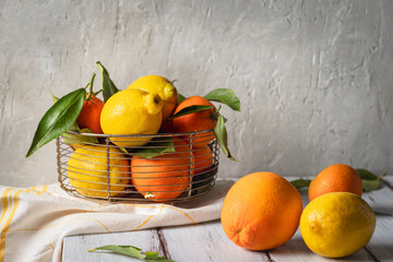 Group of citrus fruits, lemons, oranges, mandarins, clementine, mandarin. Front view.