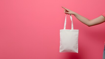 Reusable Elegance: Woman Holding Blank White Canvas Bag Mockup for Sustainable Shopping