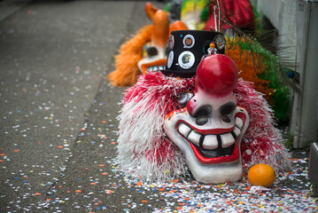Mulhouse - France - 18 February 2024 - Mulhouse - France - 17 february 2024 - Closeup of traditional carnival masks posing on the floor before the carnival - 740644245
