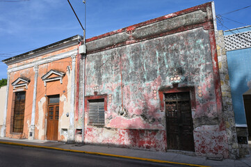 Colorful colonial style buildings at street of Merida city - 740647257