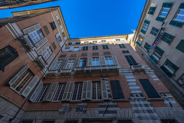The facade of the Palace of Cattaneo della Volta in the historic center of Genoa, Italy