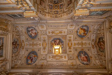GENOA, ITALY, JANUARY 19, 2024 - The ceiling of one of the rooms of the Palace of Tobia Pallavicino or Carrega - Cataldi, the Chamber of Commerce of Genoa, Italy - obrazy, fototapety, plakaty