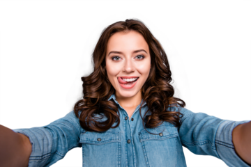 Self-portrait of nice cute stylish trendy flirty cheerful lovely attractive adorable brunette girl with wavy hair in casual denim shirt, showing tongue out, isolated over grey background