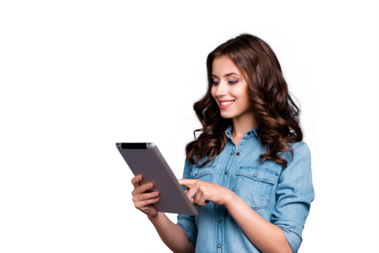 Profile side view of nice cute intelligent cheerful delicate winsome lovely magnificent girl with wavy hair in casual denim shirt, typing in digital portable computer, isolated over grey background