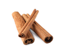 Three aromatic cinnamon sticks isolated on white