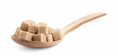 Brown sugar cubes in wooden spoon isolated on white