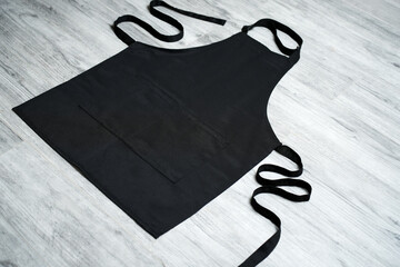 Black kitchen apron background with copy space
