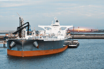 Very Large Crude Oil Carrier Tanker In The Trade Port During Bunkering Fuel Operations	