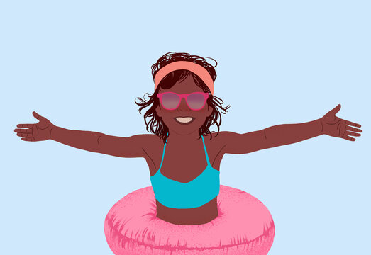 Joyful child enjoying summer in a swimming ring