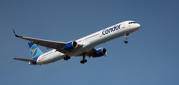 Tenerife, Spain February 18 st, 2024. Boeing 757-330 Condor Airlines flies in the blue sky. Landing at Tenerife Airport