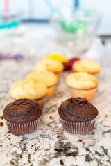 Filling Vanilla, Chocolate Cupcakes with Lemon, Raspberry