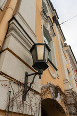 Fototapeta na wymiar St. Petersburg, Russia, February 4, 2024. Vintage lantern on the facade of an old house.