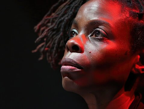 Intensely captivated actress in a theatrical performance, displaying a mix of emotions with her distinctive nose. Her engrossed expression mesmerizes the audience in this intense stage drama