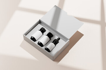 travel kit mockup for cosmetics, including a box, two bottles and a dropper bottle