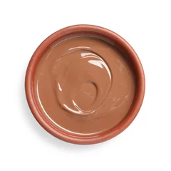  Melted milk chocolate in bowl isolated on white, top view © New Africa