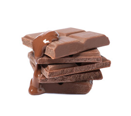 Pieces of milk chocolate with tasty paste isolated on white