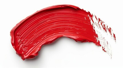 Vibrant red paint brush stroke isolated on clean white background for design projects