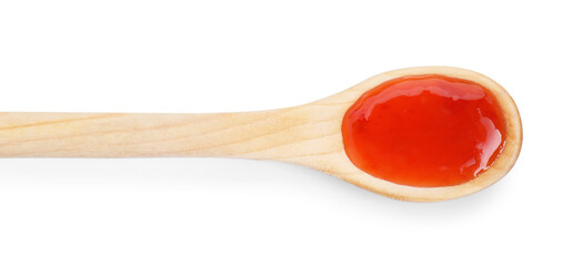 Spicy chili sauce in spoon isolated on white, top view