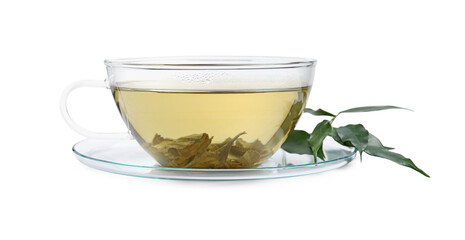 Refreshing green tea in cup and leaves isolated on white