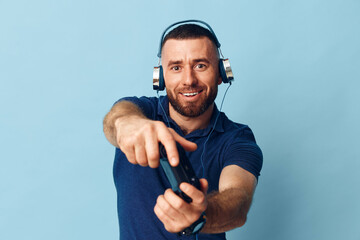 Fototapeta premium Guy background portrait technology earphones music young listen men happy adult sound men person