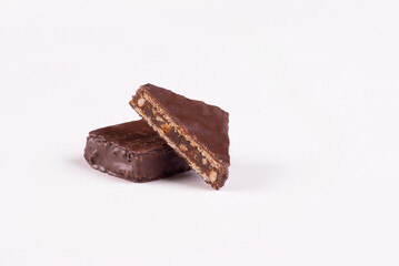 Chocolate wafer candy with jam filling on a white background