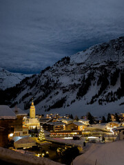 Lech am Arlberg illuminated at night by moonlight