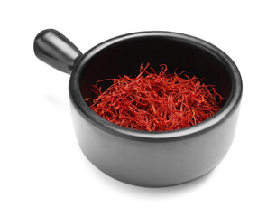 Aromatic saffron in dish isolated on white