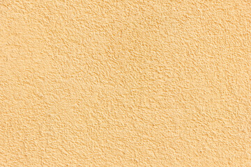 Peach color wall texture. Warm beige background.