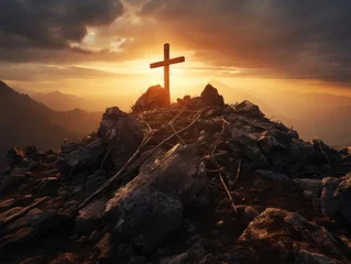 Zelfklevend Fotobehang A cross stands erect on a rocky hill in the morning light. © Vitalii But