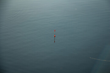 fishing on the river, fishing rod float on the surface of the water