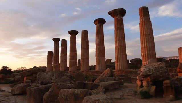 Steadicam shot of pillars of ancient temple complex in Valley of Temples in Sicily, history and architecture Italy
