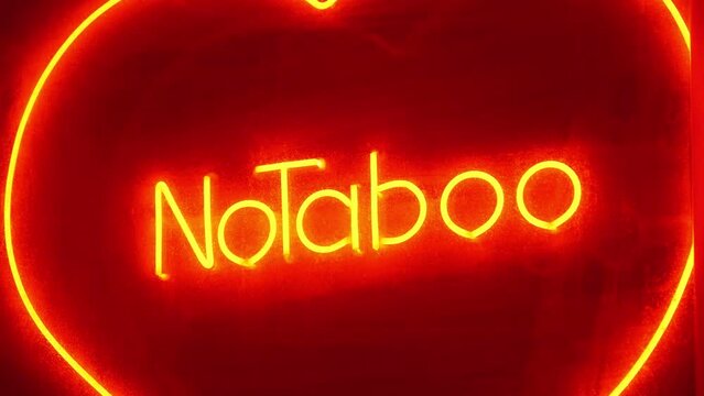 No Taboo Inscription at sex shop window. Peccability and moral degradation of society, decline in morals