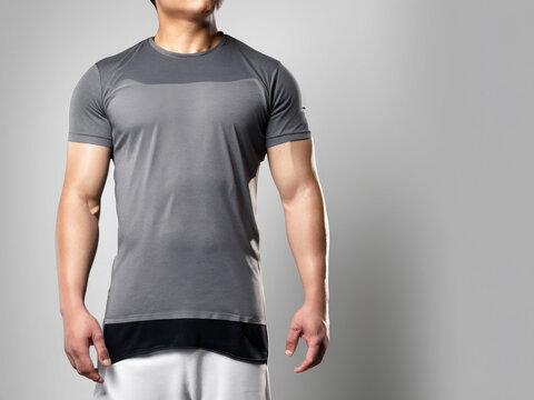mock-up of a t-shirt, blank template of a shirt, man wearing a gray shirt