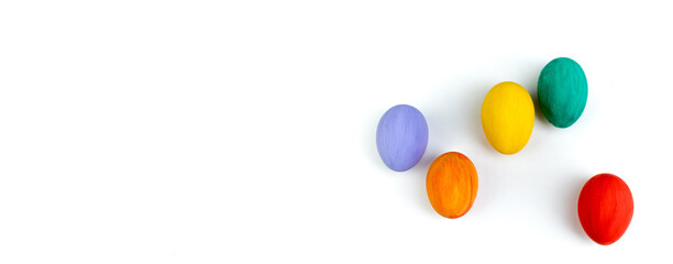 Happy Easter card. Colorful shiny easter eggs on isolated white background. Copy space for text. Banner