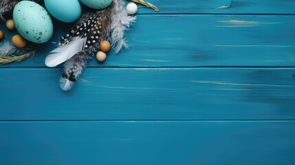 Easter banner with painted eggs and feathers on a blue wooden background. Place for text