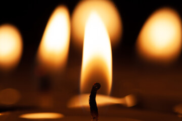 flame of burning candeles - 740736697