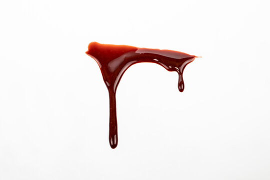 A blood spatter. A blood flowing down. Bloody pattern. Concepts of blood can be used in design